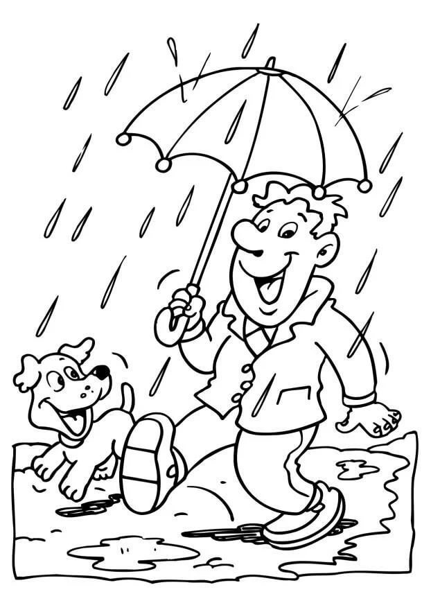 Lustiger Junge mit Regenschirm und Hund im Regen