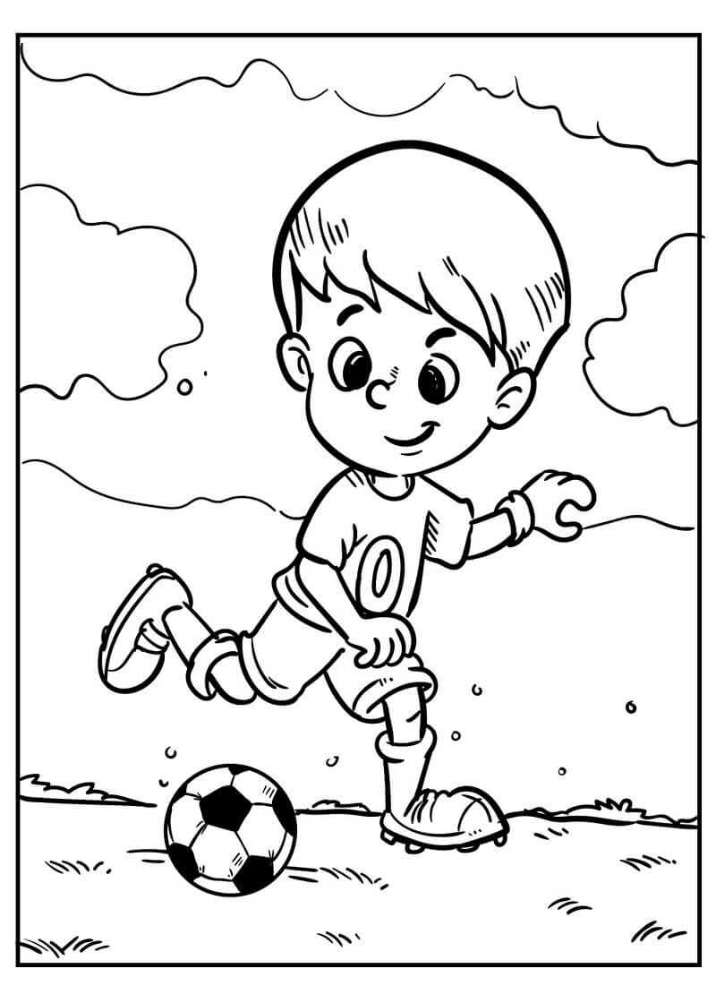 Der Junge spielt Fußball