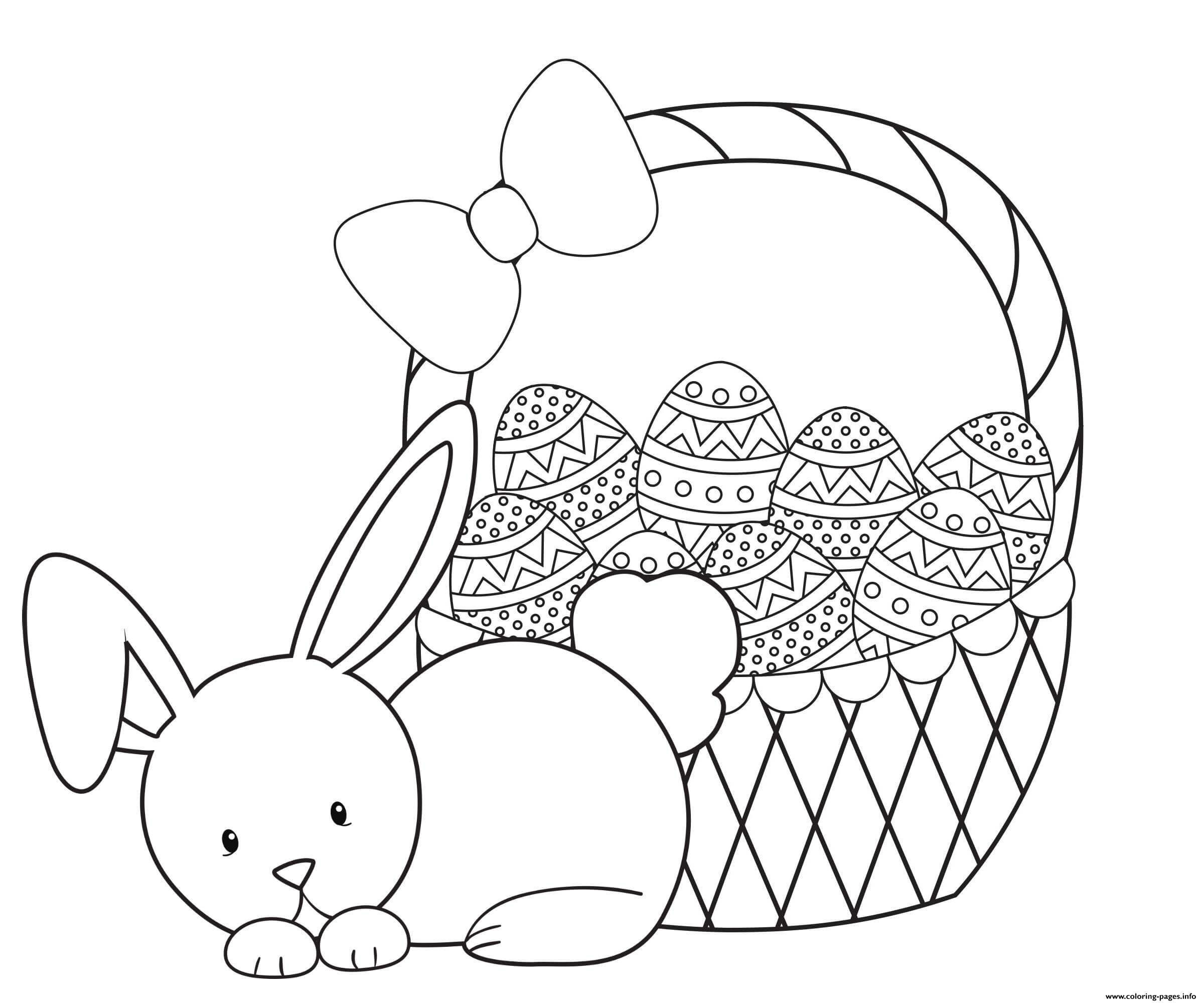 Dibujos de Lindo Conejo con Cesta de Huevos de Pascua para colorear
