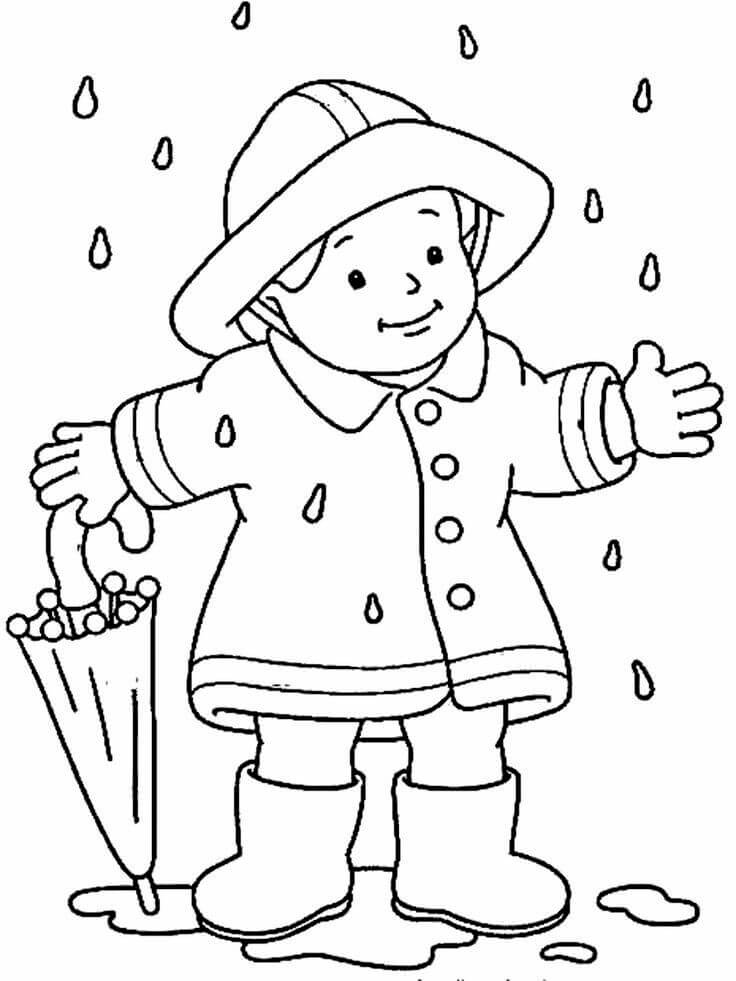 Dibujos de Niño Sosteniendo un Paraguas de pie bajo la Lluvia en Otoño para colorear