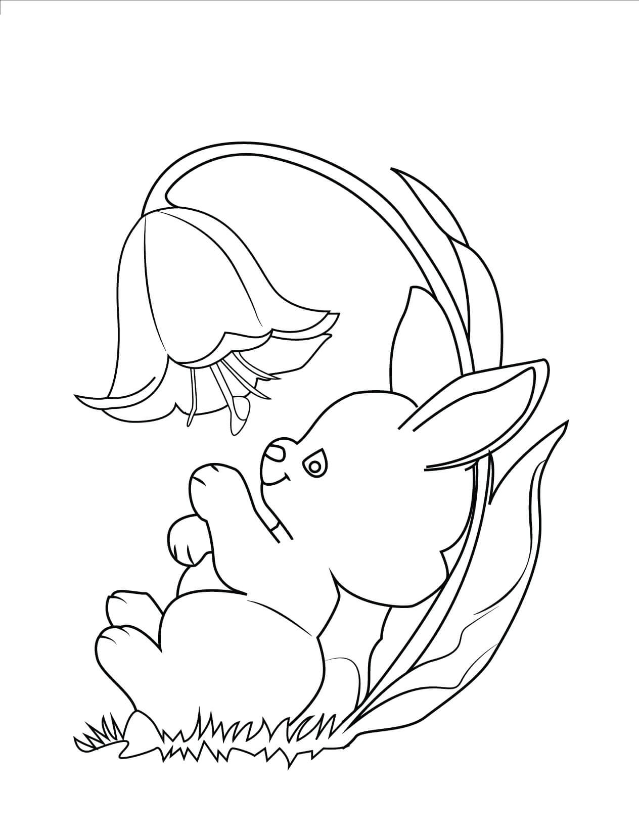 Coloriage Lapin mignon avec une fleur au printemps