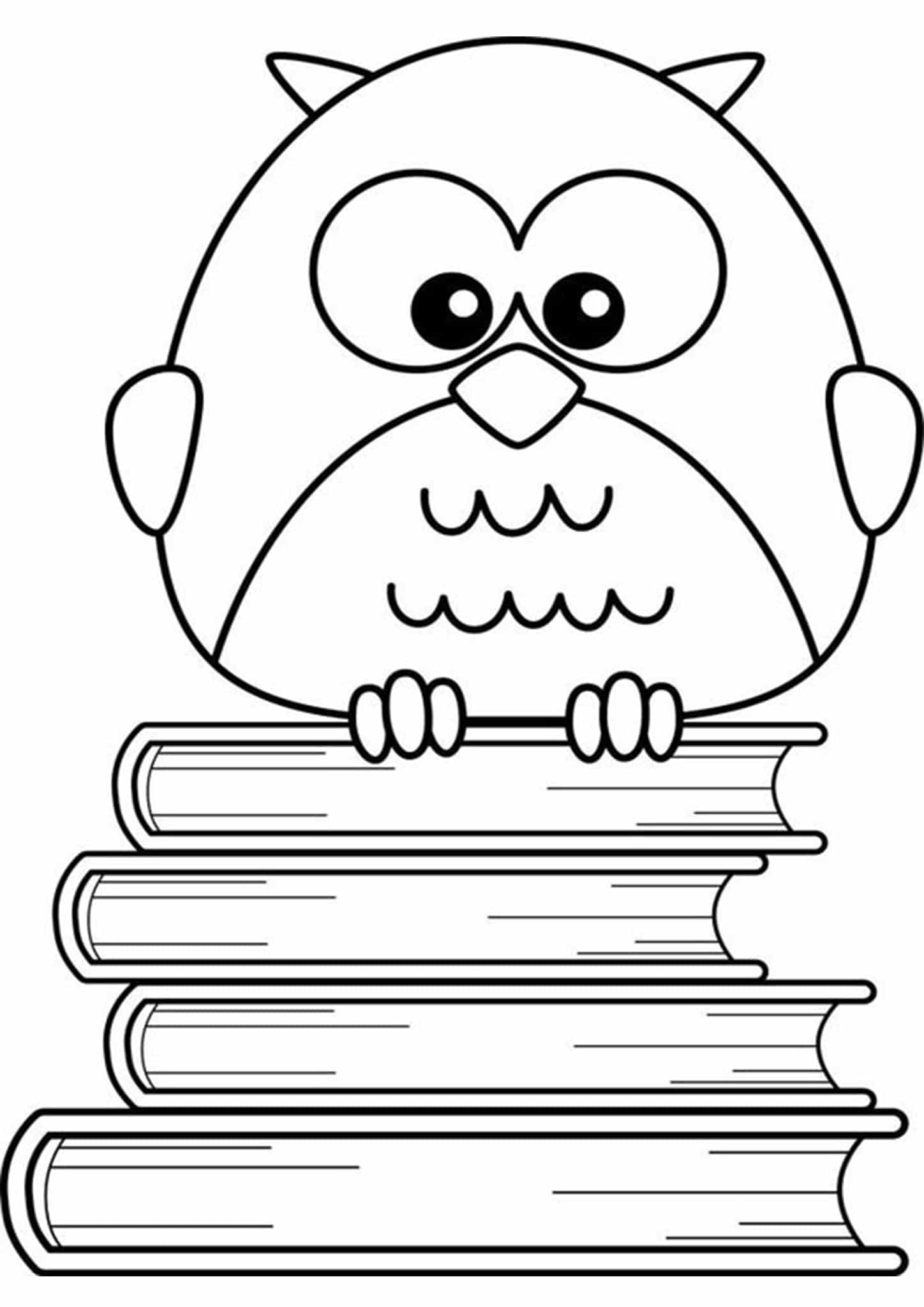 Desenhos de Coruja em pé Sobre Livros para colorir